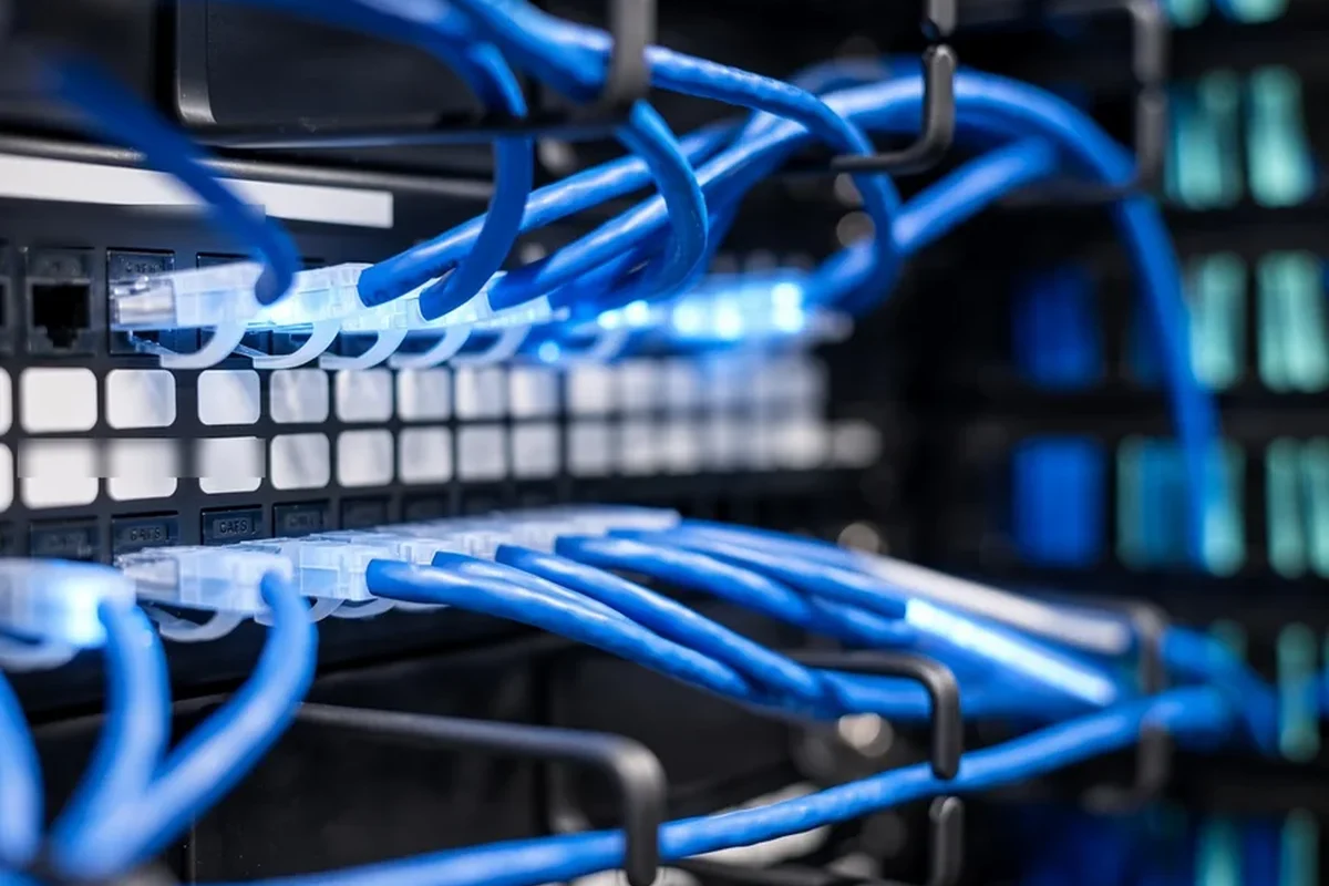 Blue network cables in a server rack